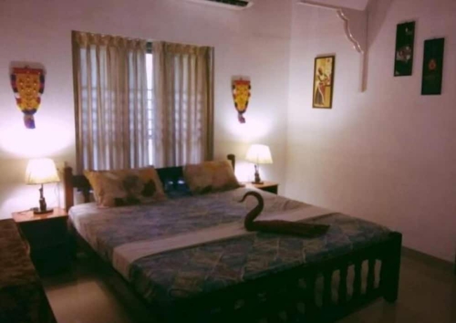 Imagen de la habitación del Hotel M R Beach and Cottages. Foto 8