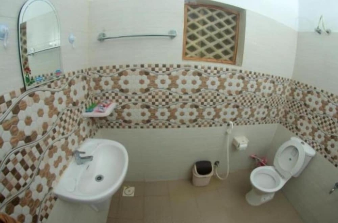 Imagen de la habitación del Hotel M R Beach and Cottages. Foto 10