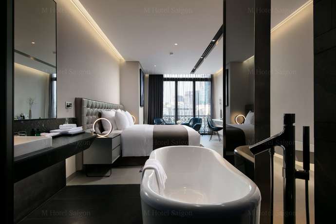 Imagen de la habitación del Hotel M Saigon. Foto 7