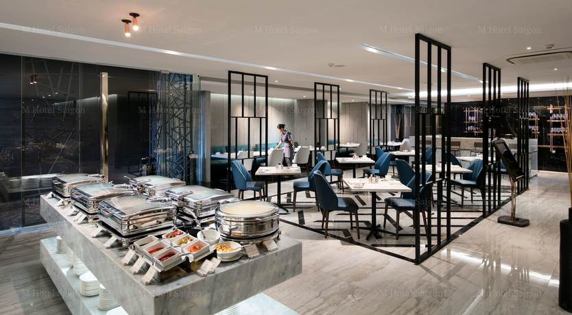 Imagen de la habitación del Hotel M Saigon. Foto 11