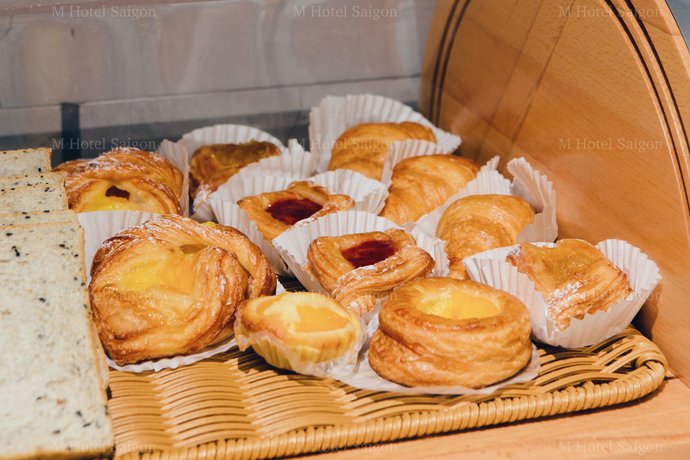 Imagen de la habitación del Hotel M Saigon. Foto 12