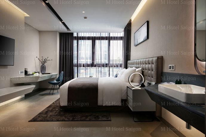 Imagen de la habitación del Hotel M Saigon. Foto 14