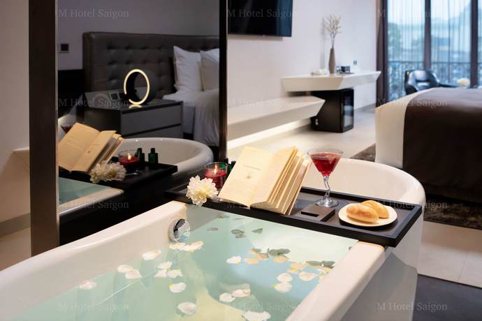 Imagen de la habitación del Hotel M Saigon. Foto 15
