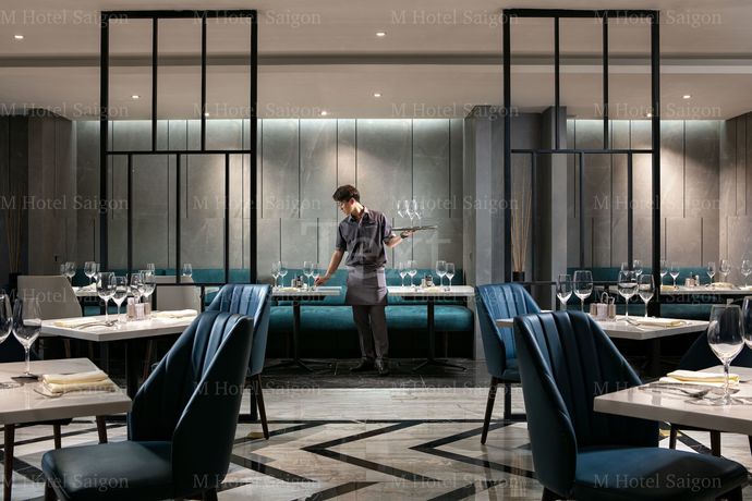 Imagen de la habitación del Hotel M Saigon. Foto 17