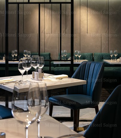 Imagen de la habitación del Hotel M Saigon. Foto 18