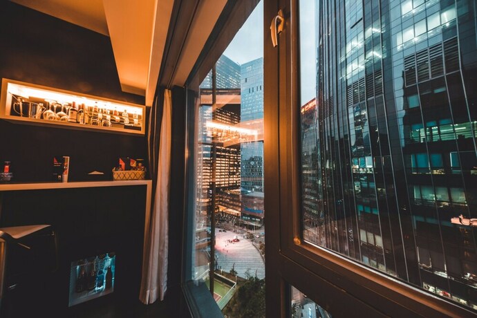 Imagen de la habitación del Hotel M, Shenzhen. Foto 33