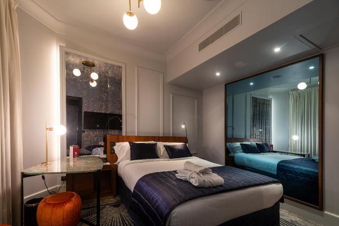 Imagen de la habitación del Hotel M Social Paris Opera. Foto 16