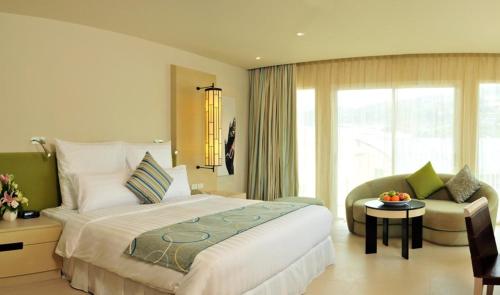 Imagen de la habitación del Hotel M Social Phuket. Foto 2
