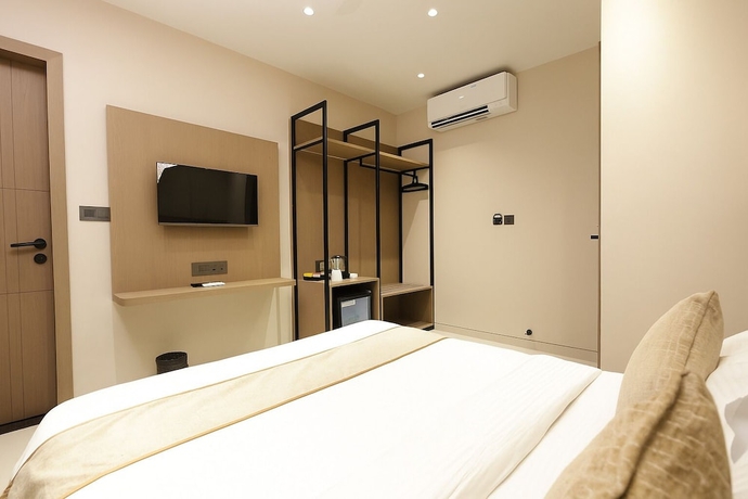 Imagen de la habitación del Hotel M Square Express, Indore. Foto 6