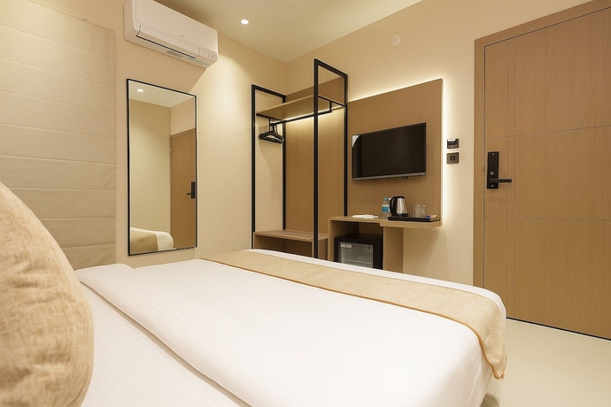 Imagen de la habitación del Hotel M Square Express, Indore. Foto 9