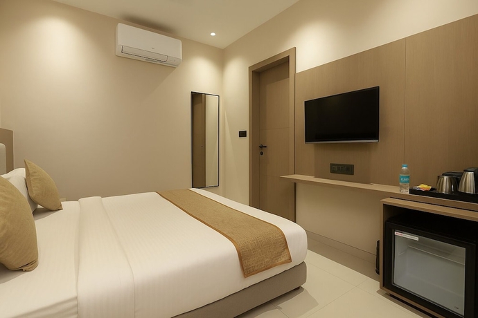 Imagen de la habitación del Hotel M Square Express, Indore. Foto 11