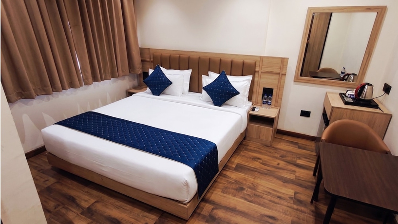 Imagen de la habitación del Hotel M Square Express, Jabalpur. Foto 1