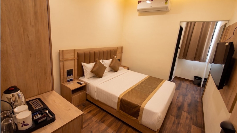 Imagen de la habitación del Hotel M Square Express, Jabalpur. Foto 7