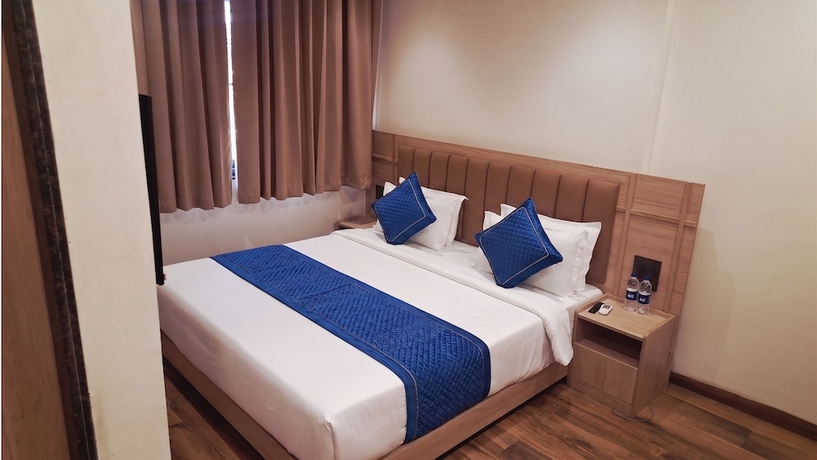 Imagen de la habitación del Hotel M Square Express, Jabalpur. Foto 8
