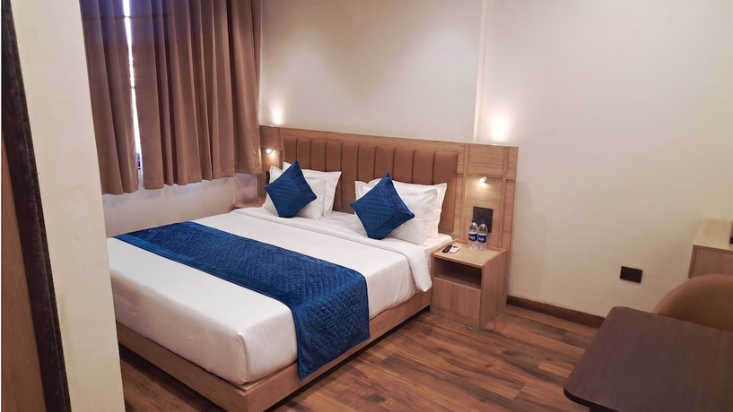 Imagen de la habitación del Hotel M Square Express, Jabalpur. Foto 11