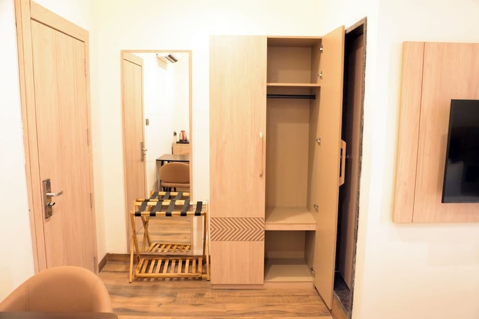 Imagen de la habitación del Hotel M Square Express, Jabalpur. Foto 12