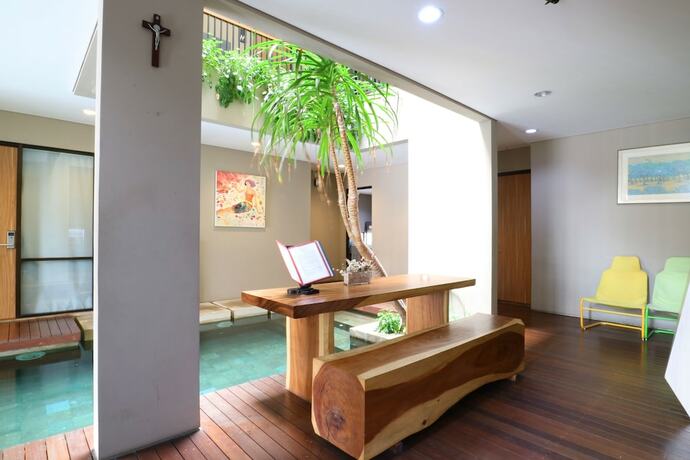 Imagen del bar/restaurante del Hotel M Suite, Tangerang. Foto 2