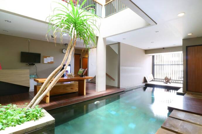 Imagen de la piscina del Hotel M Suite, Tangerang. Foto 19