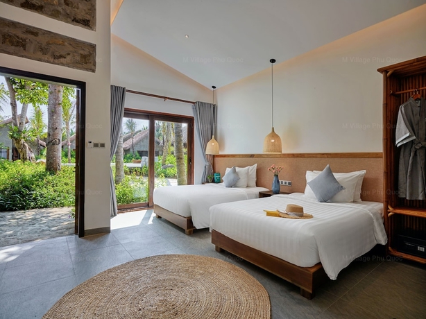Imagen de la habitación del Hotel M Village Phu Quoc. Foto 3