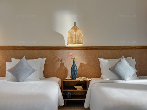 Imagen de la habitación del Hotel M Village Phu Quoc. Foto 4