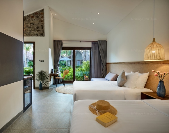 Imagen de la habitación del Hotel M Village Phu Quoc. Foto 7