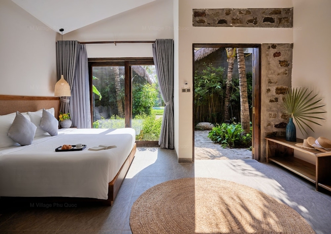 Imagen de la habitación del Hotel M Village Phu Quoc. Foto 9