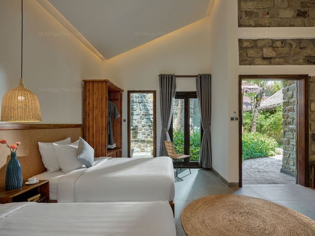 Imagen de la habitación del Hotel M Village Phu Quoc. Foto 17