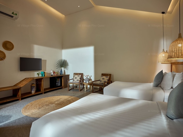 Imagen de la habitación del Hotel M Village Phu Quoc. Foto 18