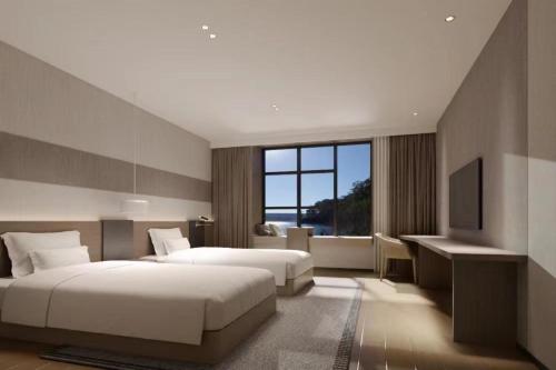 Imagen de la habitación del Hotel M Xiamen Haicang Maqing Road Metro Station. Foto 18