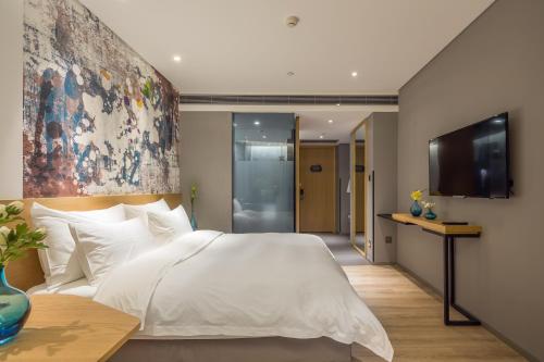 Imagen general del Hotel M Zhengzhou. Foto 11