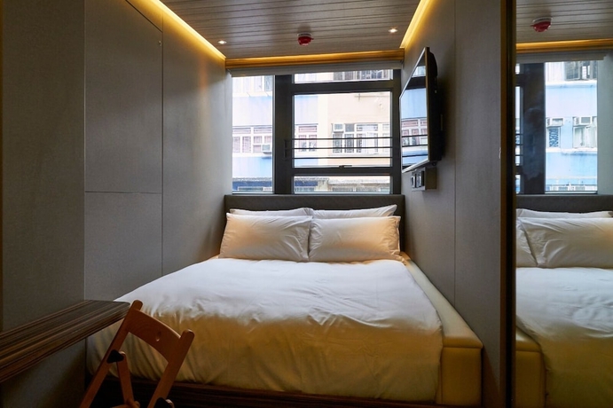 Imagen de la habitación del Hotel M plus. Foto 5