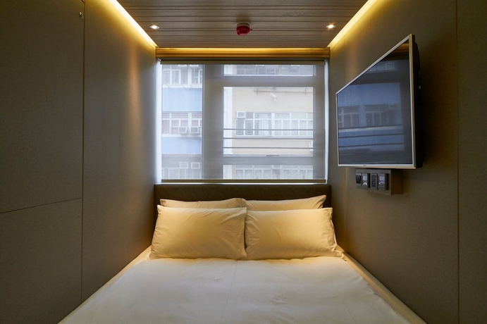 Imagen de la habitación del Hotel M plus. Foto 6