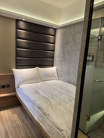 Imagen de la habitación del Hotel M plus. Foto 7