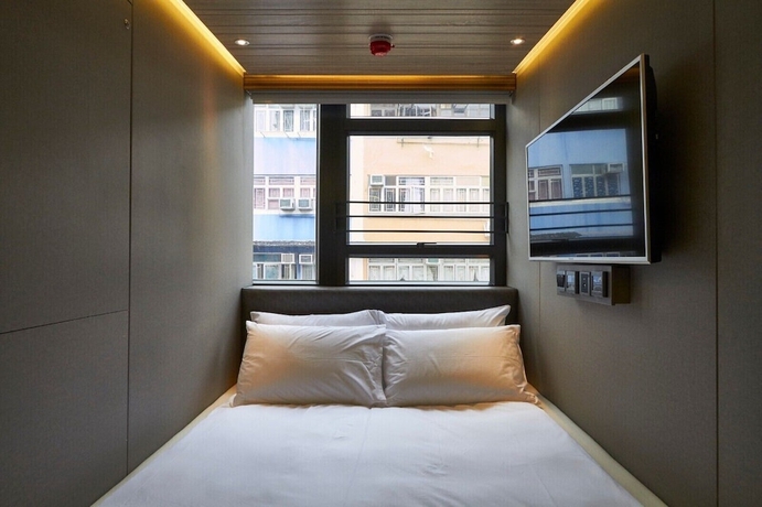Imagen de la habitación del Hotel M plus. Foto 14