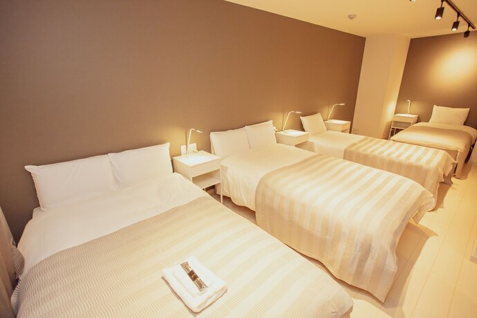 Imagen de la habitación del Hotel M-1 Osaka Tsukamoto. Foto 9