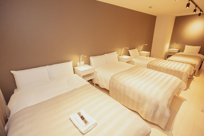 Imagen de la habitación del Hotel M-1 Osaka Tsukamoto. Foto 15