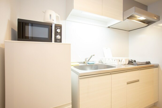 Imagen de la habitación del Hotel M-1 Osaka Tsukamoto. Foto 18