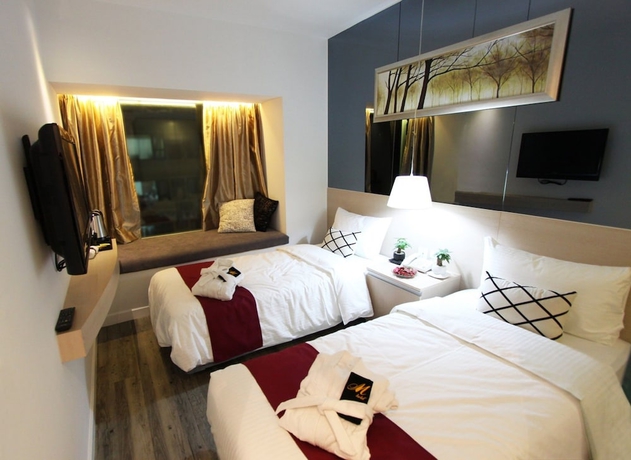 Imagen de la habitación del Hotel M1 Yau Ma Tei. Foto 13