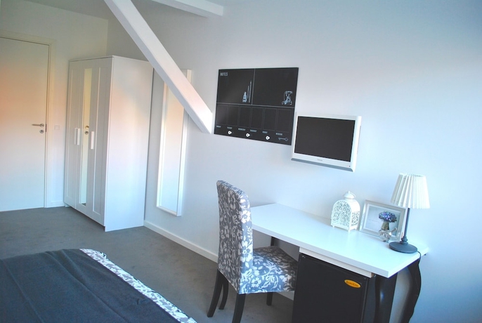 Imagen de la habitación del Hotel M18. Foto 9