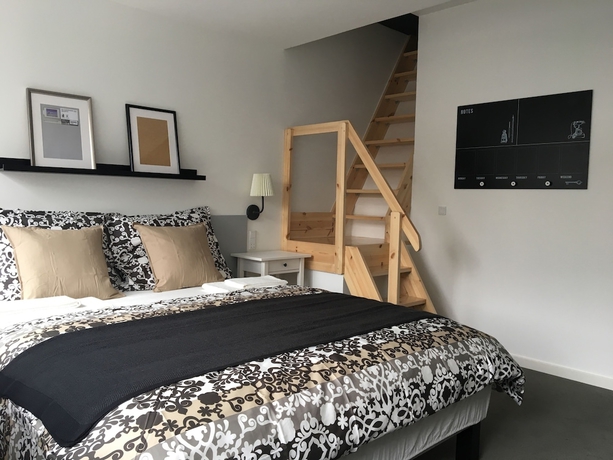 Imagen de la habitación del Hotel M18. Foto 11