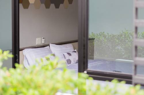 Imagen de la habitación del Hotel M2. Foto 6