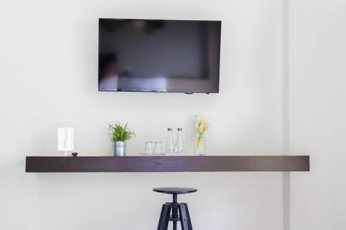 Imagen de la habitación del Hotel M2. Foto 9