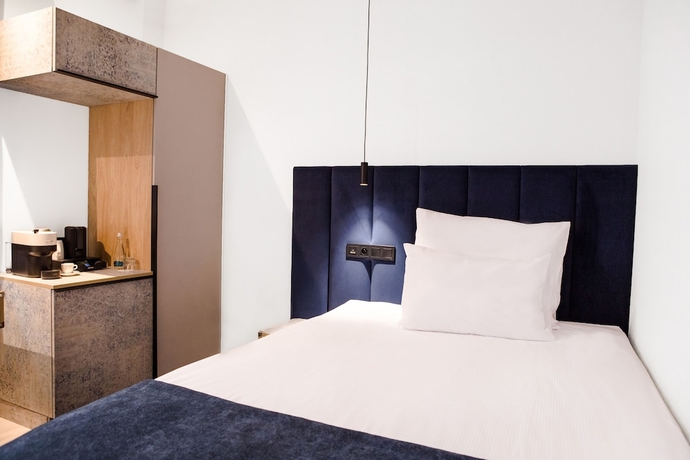 Imagen de la habitación del Hotel M23. Foto 3