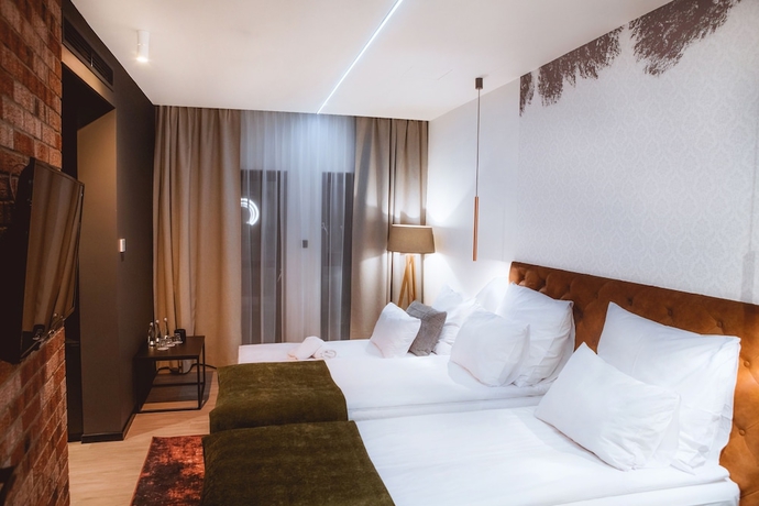 Imagen de la habitación del Hotel M23. Foto 4