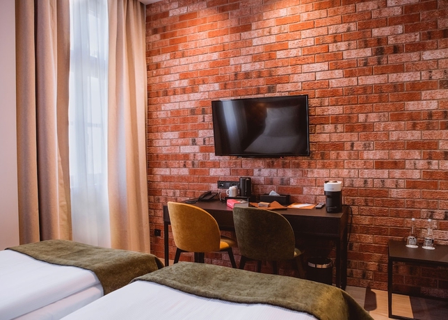 Imagen de la habitación del Hotel M23. Foto 8