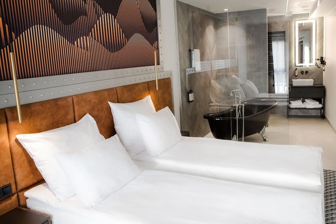 Imagen de la habitación del Hotel M23. Foto 10