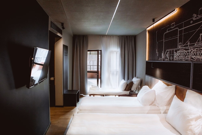 Imagen de la habitación del Hotel M23. Foto 18