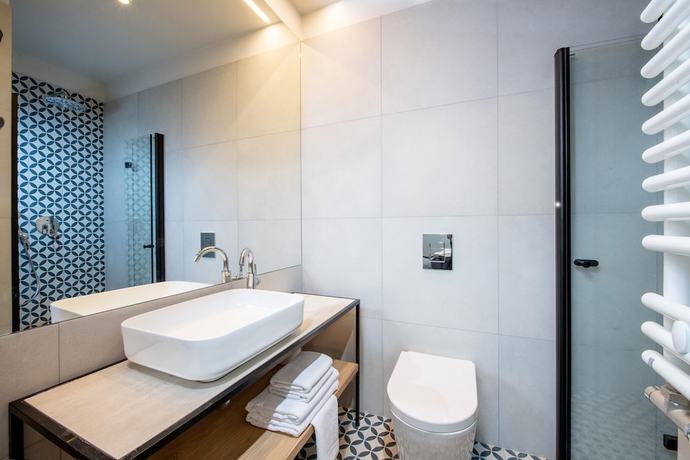 Imagen de la habitación del Hotel M29. Foto 15