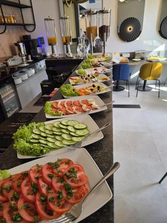 Imagen del bar/restaurante del Hotel M4 Boutique. Foto 2