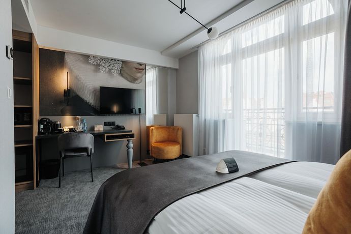 Imagen de la habitación del Hotel M4 Boutique. Foto 7